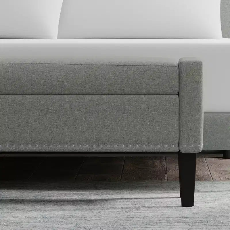 Banc de rangement capitonné avec accoudoirs tronqués