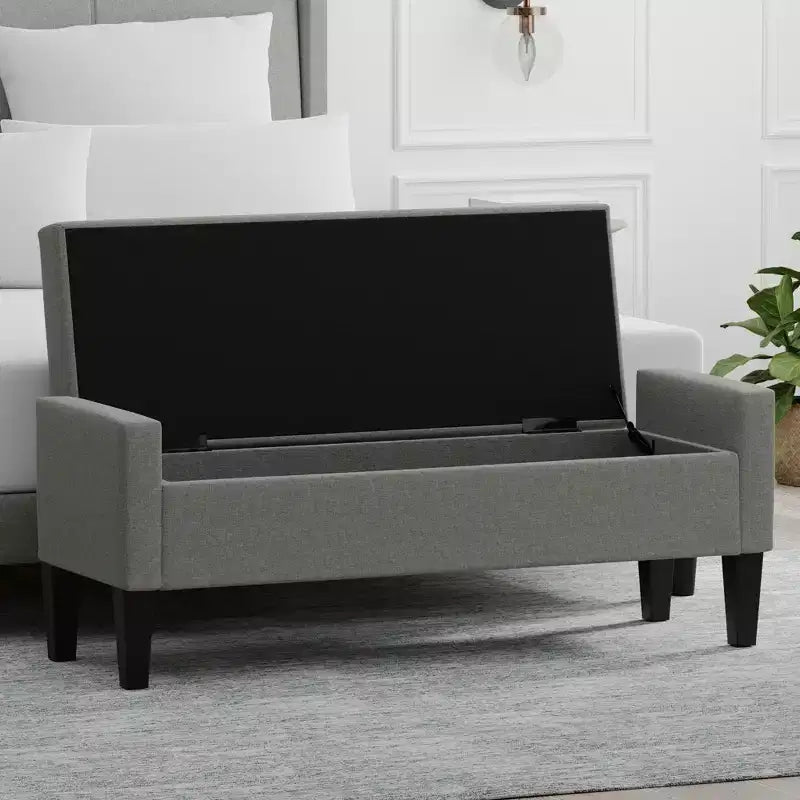 Banc de rangement capitonné avec accoudoirs tronqués