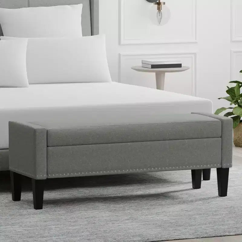 Banc de rangement capitonné avec accoudoirs tronqués